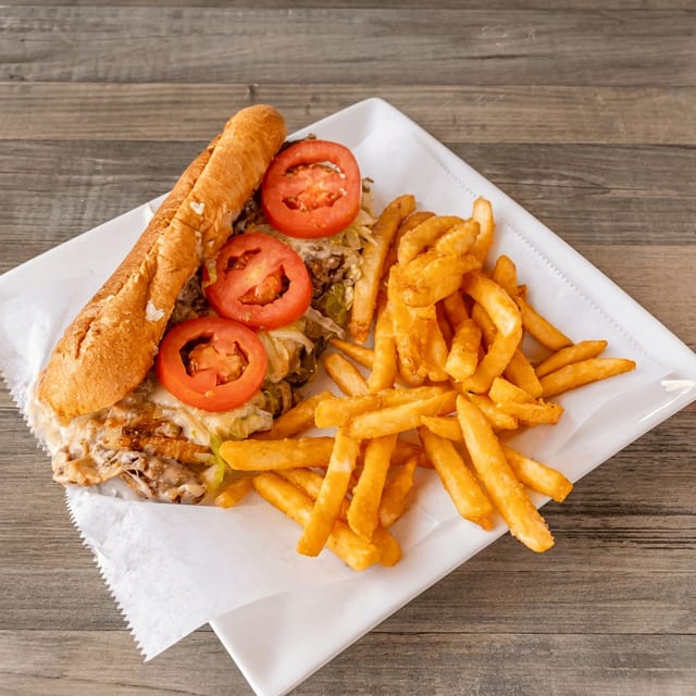 Chicken Philly Cheese Steak With Fries.
